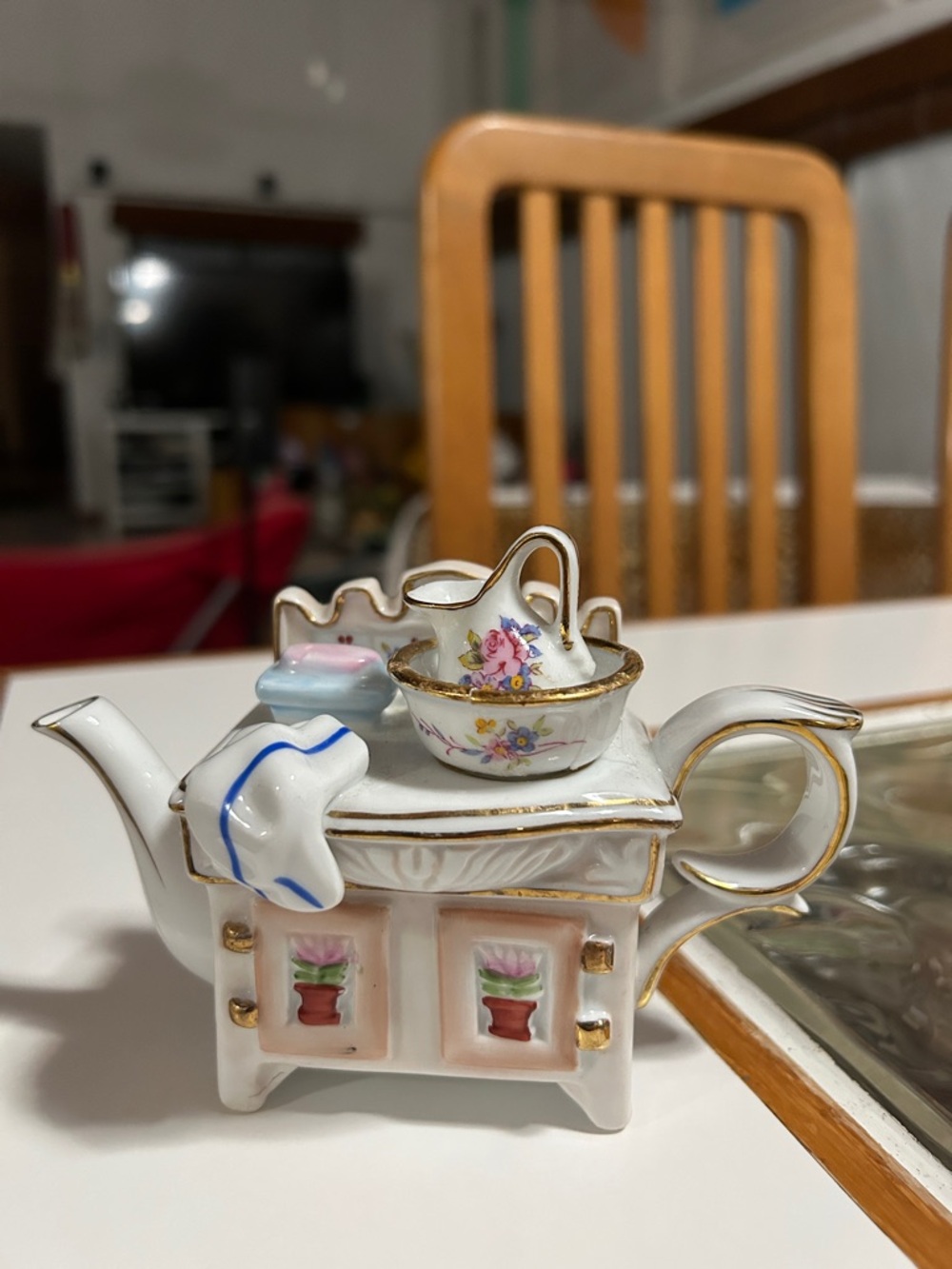 Vintage limoges china washbasin figurine with removable wash bowl and pitcher.